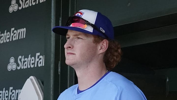 Aug 15, 2025; Chicago, Illinois, USA; Chicago Cubs outfielder Owen Caissie (19) in the dugout during the first inning against the Pittsburgh Pirates at Wrigley Field. Mandatory Credit: David Banks-Imagn Images