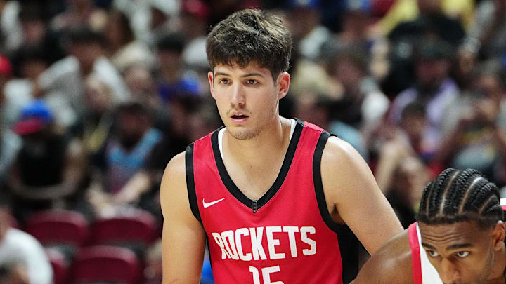 Jul 14, 2024; Las Vegas, NV, USA; Houston Rockets guard Reed Sheppard (15) and Washington Wizards forward Alex Sarr (12) await a free throw attempt during the second quarter at Thomas & Mack Center. Mandatory Credit: Stephen R. Sylvanie-Imagn Images Jul 14, 2024; Las Vegas, NV, USA; Houston Rockets guard Reed Sheppard (15) and Washington Wizards forward Alex Sarr (12) await a free throw attempt during the second quarter at Thomas & Mack Center. Mandatory Credit: Stephen R. Sylvanie-Imagn Images