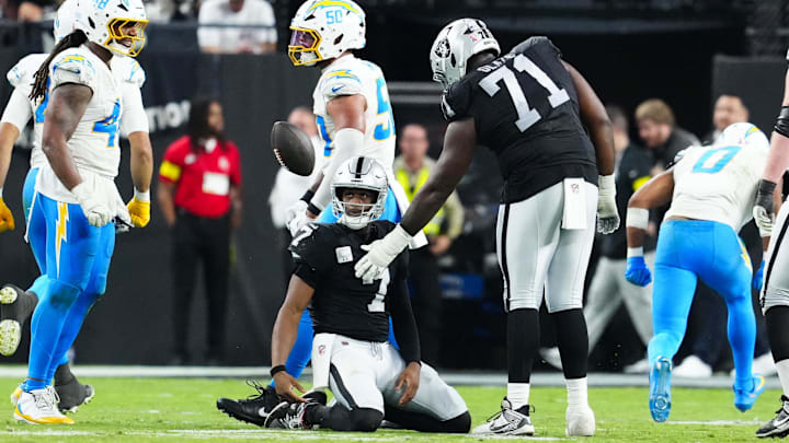 Sep 15, 2025; Paradise, Nevada, USA; Las Vegas Raiders quarterback Geno Smith (7) reacts after a failed fourth down conversion during the fourth quarter against the Los Angeles Chargers at Allegiant Stadium. Mandatory Credit: Stephen R. Sylvanie-Imagn Images Sep 15, 2025; Paradise, Nevada, USA; Las Vegas Raiders quarterback Geno Smith (7) reacts after a failed fourth down conversion during the fourth quarter against the Los Angeles Chargers at Allegiant Stadium. Mandatory Credit: Stephen R. Sylvanie-Imagn Images