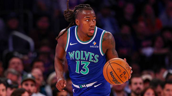 Oct 12, 2026; New York, New York, USA;  Minnesota Timberwolves point guard Ayo Dosunmu (13) dribbles up court during the first half against the New York Knicks at Madison Square Garden.  Mandatory Credit: Vincent Carchietta-Imagn Images