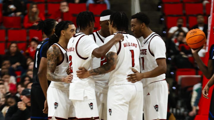 Dec 6, 2025; Raleigh, North Carolina, USA;  NC State Wolfpack huddle during the second half of the game against the UNC Asheville Bulldogs at Lenovo Center. Mandatory Credit: Jaylynn Nash-Imagn Images