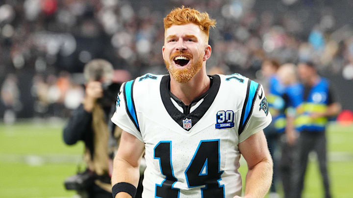 Sep 22, 2024; Paradise, Nevada, USA; Carolina Panthers quarterback Andy Dalton (14) celebrates after the Panthers defeated the Las Vegas Raiders at Allegiant Stadium. Mandatory Credit: Stephen R. Sylvanie-Imagn Images Sep 22, 2024; Paradise, Nevada, USA; Carolina Panthers quarterback Andy Dalton (14) celebrates after the Panthers defeated the Las Vegas Raiders at Allegiant Stadium. Mandatory Credit: Stephen R. Sylvanie-Imagn Images