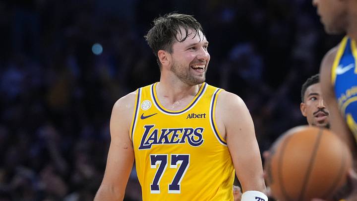 Oct 21, 2026; Los Angeles, California, USA; Los Angeles Lakers guard Luka Doncic (77) reacts against the Golden State Warriors in the first half at Crypto.com Arena. Mandatory Credit: Kirby Lee-Imagn Images