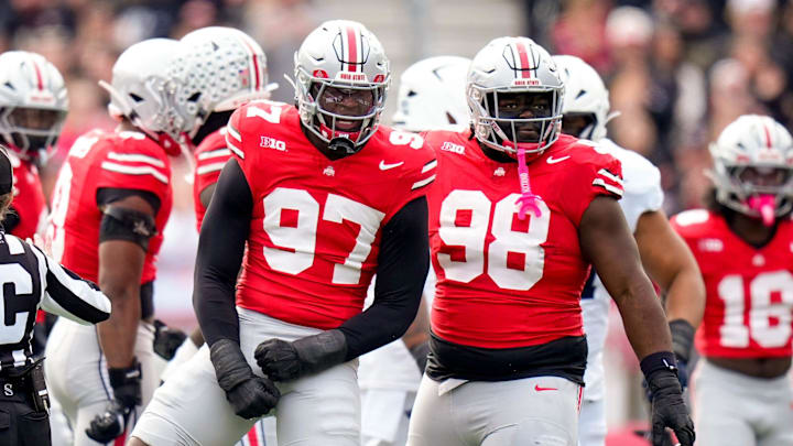Ohio State Buckeyes defensive end Kenyatta Jackson Jr. (97) and defensive tackle Kayden McDonald (98) celebrate in the first half of the college football game at Ohio Stadium on Saturday, Nov. 1, 2025 in Columbus, Ohio.