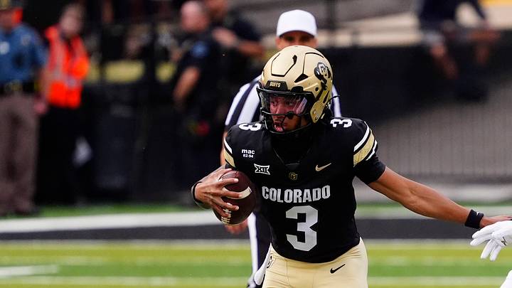 Aug 29, 2025; Boulder, Colorado, USA; Colorado Buffaloes quarterback Kaidon Salter (3) carries the ball n the first quarter against the Georgia Tech Yellow Jackets at Folsom Field. Mandatory Credit: Ron Chenoy-Imagn Images