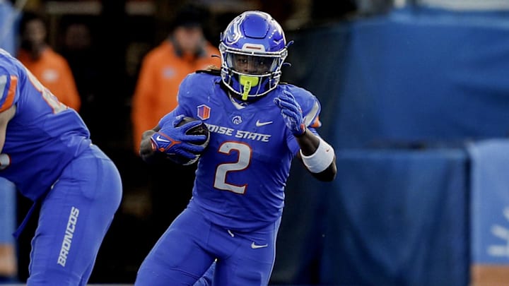 Nov 24, 2023; Boise, Idaho, USA;  Boise State Broncos running back Ashton Jeanty (2) carries the ball during the second half against the Air Force Falcons at Albertsons Stadium. Boise State defeats Air Force 27-19. Mandatory Credit: Brian Losness-Imagn Images