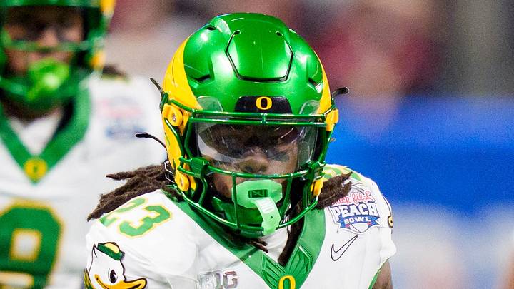 Oregon running back Dierre Hill Jr. carries the ball as the Oregon Ducks face the Indiana Hoosiers in the Peach Bowl on Jan. 9, 2026, at Mercedes-Benz Stadium in Atlanta, Georgia.