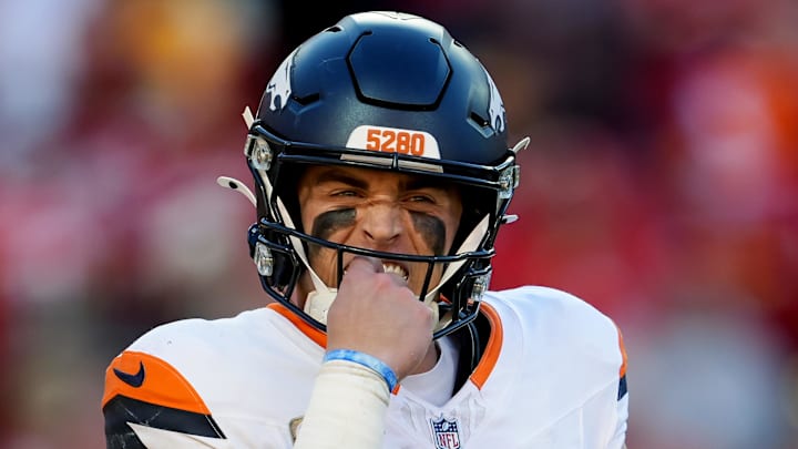 Nov 10, 2024; Kansas City, Missouri, USA; Denver Broncos quarterback Bo Nix (10) reacts during the second half against the Kansas City Chiefs at GEHA Field at Arrowhead Stadium. Mandatory Credit: Jay Biggerstaff-Imagn Images
