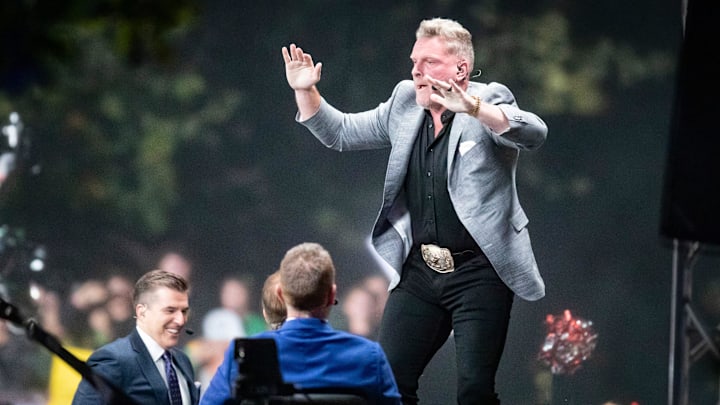 Host Pat McAfee dances on his chair to “Shout” during ESPN’s “College GameDay” Saturday, Oct. 12, 2024 on the campus of the University of Oregon in Eugene, Ore.