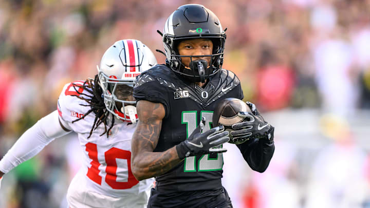 Oct 12, 2024; Eugene, Oregon, USA; Oregon Ducks wide receiver Tez Johnson (15) makes a catch for a touchdown during the second quarter against the Ohio State Buckeyes at Autzen Stadium. Mandatory Credit: Craig Strobeck-Imagn Images