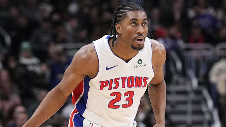 Detroit Pistons guard Jaden Ivey (23) pushes the ball up the court against the Milwaukee Bucks in the second half at Fiserv Forum.
