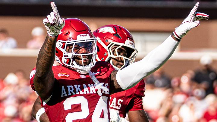Arkansas Razorbacks safety Miguel Mitchell celebrates after making a tackle in the first half.