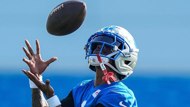 Detroit Lions wide receiver Jameson Williams (1) practices during training camp at team's Peformance Center