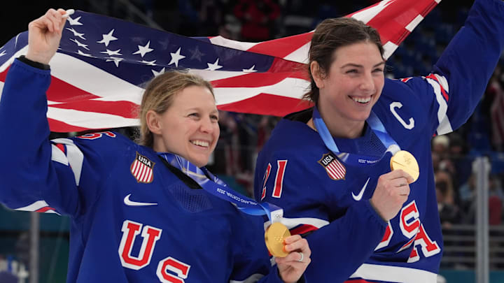 Feb 19, 2026; Milan, Italy; Kendall Coyne (26) of the United States and Hilary Knight (21) of the United States celebrate after winning the gold medal in women's ice hockey after defeating Canada during the Milano Cortina 2026 Olympic Winter Games at Milano Santagiulia Ice Hockey Arena. Mandatory Credit: Amber Searls-Imagn Images