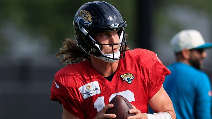 Jacksonville Jaguars quarterback Trevor Lawrence (16) rolls out of the pocket during a joint Buccaneers‑Jaguars NFL practice at the Miller Electric Center on Tuesday, Aug. 25, 2026, in Jacksonville, Fla.
