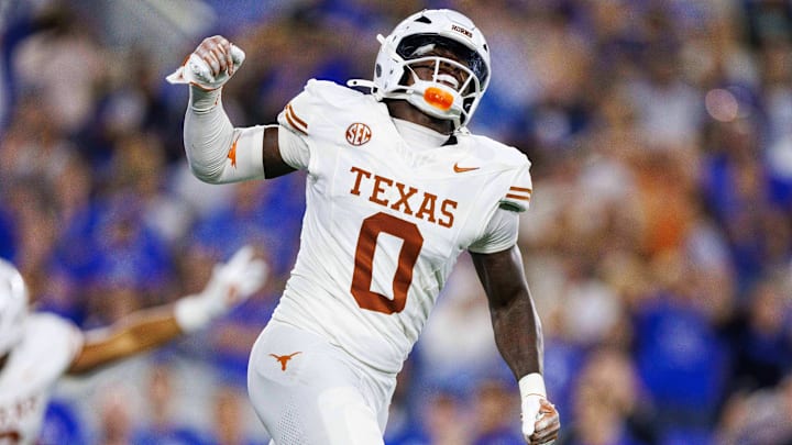 Texas Longhorns linebacker Anthony Hill Jr. celebrates after the Kentucky Wildcats fail to score in overtime.