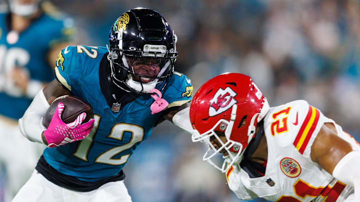 Oct 6, 2025; Jacksonville, Florida, USA; Jacksonville Jaguars wide receiver Travis Hunter (12) pushes Kansas City Chiefs defensive back Jaden Hicks (21) at EverBank Stadium. Mandatory Credit: Morgan Tencza-Imagn Images Oct 6, 2025; Jacksonville, Florida, USA; Jacksonville Jaguars wide receiver Travis Hunter (12) pushes Kansas City Chiefs defensive back Jaden Hicks (21) at EverBank Stadium. Mandatory Credit: Morgan Tencza-Imagn Images