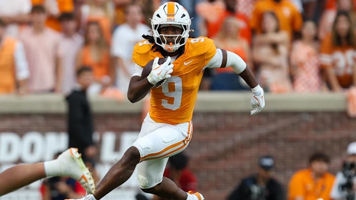 Oct 11, 2025; Knoxville, Tennessee, USA; Tennessee Volunteers running back Star Thomas (9) runs the ball against the Tennessee Volunteers during the second half at Neyland Stadium. Mandatory Credit: Randy Sartin-Imagn Images
