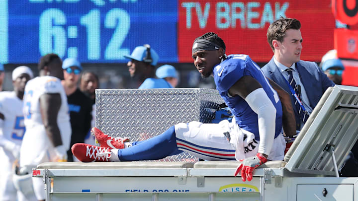 Sep 28, 2025; East Rutherford, New Jersey, USA; New York Giants wide receiver Malik Nabers (1) is carted off the field following an injury during the second quarter against the Los Angeles Chargers at MetLife Stadium. Mandatory Credit: Brad Penner-Imagn Images Sep 28, 2025; East Rutherford, New Jersey, USA; New York Giants wide receiver Malik Nabers (1) is carted off the field following an injury during the second quarter against the Los Angeles Chargers at MetLife Stadium. Mandatory Credit: Brad Penner-Imagn Images