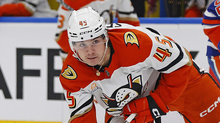Mar 28, 2026; Edmonton, Alberta, CAN; Anaheim Ducks forward Beckett Sennecke (45) looks to make a pass after being tripped up by Edmonton Oilers forward Vasily Podkolzin (92) during the second period at Rogers Place. Mandatory Credit: Perry Nelson-Imagn Images