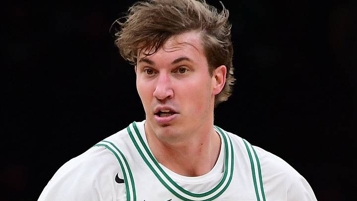 Oct 10, 2026; Boston, Massachusetts, USA;  Boston Celtics guard Baylor Scheierman (55) controls the ball during the second half against the Philadelphia 76ers at TD Garden. Mandatory Credit: Bob DeChiara-Imagn Images