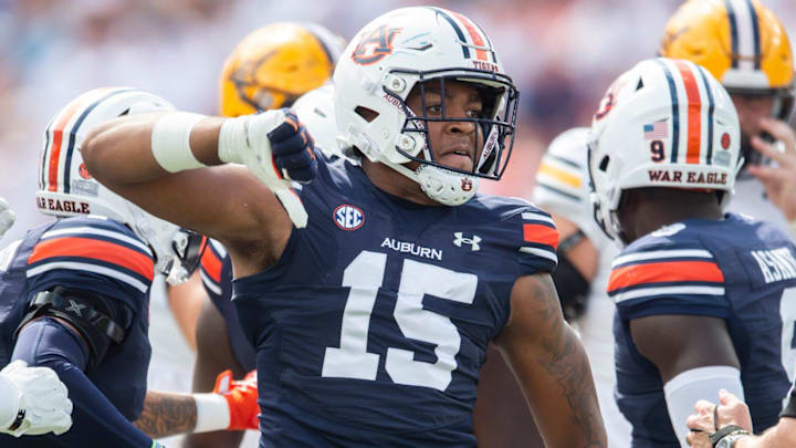 Auburn Tigers defensive lineman Keldric Faulk celebrates a stop as Auburn Tigers take on California Golden Bears.