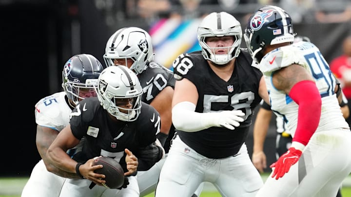 Oct 12, 2025; Paradise, Nevada, USA; Las Vegas Raiders quarterback Geno Smith (7) runs the ball during the second half against the Tennessee Titans at Allegiant Stadium. Mandatory Credit: Stephen R. Sylvanie-Imagn Images Oct 12, 2025; Paradise, Nevada, USA; Las Vegas Raiders quarterback Geno Smith (7) runs the ball during the second half against the Tennessee Titans at Allegiant Stadium. Mandatory Credit: Stephen R. Sylvanie-Imagn Images