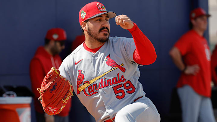 Feb 16, 2026; Jupiter, FL, USA;  St. Louis Cardinals pitcher JoJo Romero throws a pitch during spring training workouts at Roger Dean Stadium. Mandatory Credit: Reinhold Matay-Imagn Images
