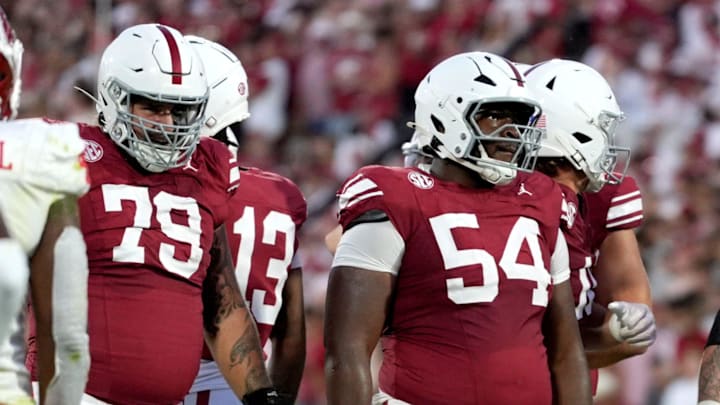 Oklahoma Sooners offensive linemen Jake Taylor (79) and Febechi Nwaiwu (54). Oklahoma Sooners offensive linemen Jake Taylor (79) and Febechi Nwaiwu (54).