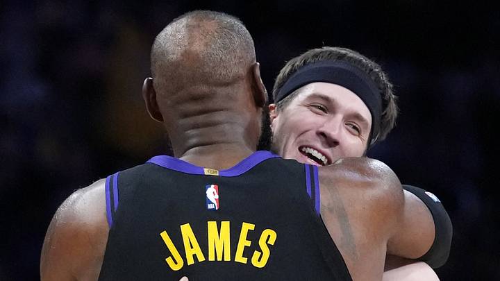 Nov 18, 2025; Los Angeles, California, USA; Los Angeles Lakers guard Austin Reaves (15) is embraced by forward LeBron James (23) in the second quarter at Crypto.com Arena. Mandatory Credit: Kirby Lee-Imagn Images Nov 18, 2025; Los Angeles, California, USA; Los Angeles Lakers guard Austin Reaves (15) is embraced by forward LeBron James (23) in the second quarter at Crypto.com Arena. Mandatory Credit: Kirby Lee-Imagn Images