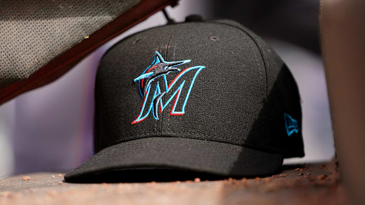 Apr 11, 2019; Cincinnati, OH, USA; A view of a New Era Miami Marlins hat in the dugout during the game against the Cincinnati Reds at Great American Ball Park. Mandatory Credit: Aaron Doster-Imagn Images Apr 11, 2019; Cincinnati, OH, USA; A view of a New Era Miami Marlins hat in the dugout during the game against the Cincinnati Reds at Great American Ball Park. Mandatory Credit: Aaron Doster-Imagn Images