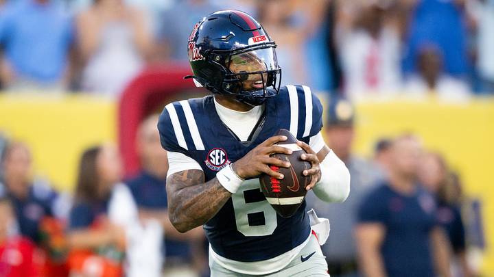Sep 6, 2026; Nashville, Tennessee, USA; Ole Miss Rebels quarterback Trinidad Chambliss (6) rolls out to throw a pass against the Louisville Cardinals during the first half at Nissan Stadium. Mandatory Credit: Steve Roberts-Imagn Images Sep 6, 2026; Nashville, Tennessee, USA; Ole Miss Rebels quarterback Trinidad Chambliss (6) rolls out to throw a pass against the Louisville Cardinals during the first half at Nissan Stadium. Mandatory Credit: Steve Roberts-Imagn Images