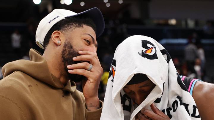 Apr 10, 2026; Washington, District of Columbia, USA; Injured Washington Wizards forward Anthony Davis (L) talks with Miami Heat center Bam Adebayo (13) after their game at Capital One Arena. Mandatory Credit: Geoff Burke-Imagn Images