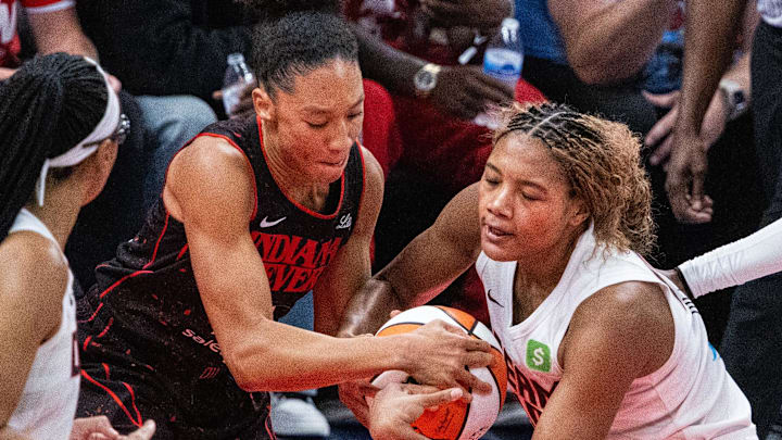 Sep 16, 2025; Indianapolis, Indiana, USA; Indiana Fever guard Aerial Powers (23) and Atlanta Dream forward Naz Hillmon (00) fight for the ball during game two of round one for the 2025 WNBA Playoffs at Gainbridge Fieldhouse. Mandatory Credit: Trevor Ruszkowski-Imagn Images Sep 16, 2025; Indianapolis, Indiana, USA; Indiana Fever guard Aerial Powers (23) and Atlanta Dream forward Naz Hillmon (00) fight for the ball during game two of round one for the 2025 WNBA Playoffs at Gainbridge Fieldhouse. Mandatory Credit: Trevor Ruszkowski-Imagn Images