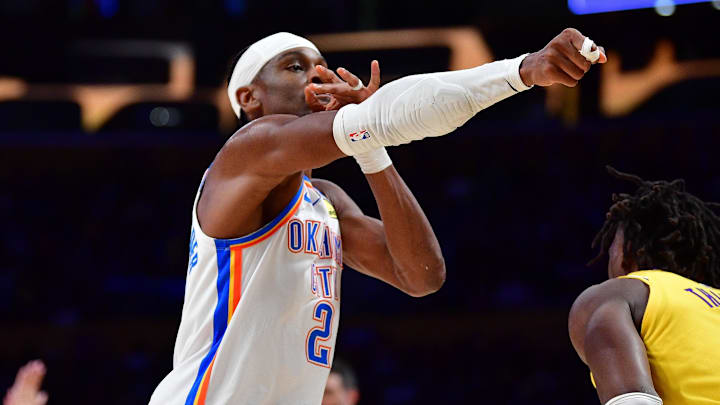 April 7, 2026; Los Angeles, California, USA; Oklahoma City Thunder guard Shai Gilgeous-Alexander (2) reacts after scoring three point basket against the Los Angeles Lakers during the second half at Crypto.com Arena. Mandatory Credit: Gary A. Vasquez-Imagn Images