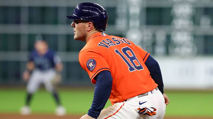 Houston Astros center fielder Daulton Varsho (18) takes a lead off first base. 