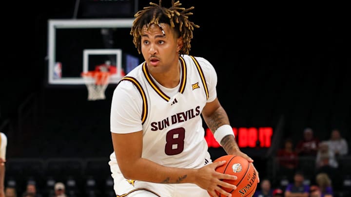 Dec 6, 2025; Phoenix, Arizona, USA; Arizona State University Sun Devils forward Marcus Adams Jr. (8) dribbles the ball against Oklahoma University Sooners in the second half at PHX Arena. Mandatory Credit: Anna Carrington-Imagn Images