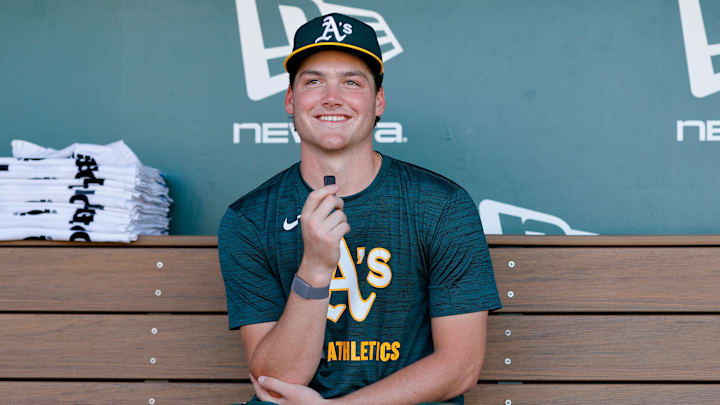Jul 28, 2025; West Sacramento, California, USA; Athletics 2025 1st round draft pick Jamie Arnold speaks with members of the media before the game against the Seattle Mariners at Sutter Health Park. Mandatory Credit: Sergio Estrada-Imagn Images