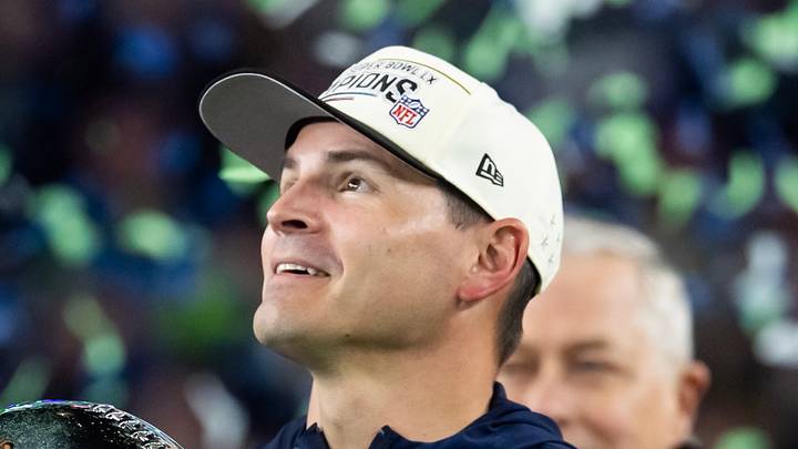 Seattle Seahawks head coach Mike Macdonald celebrates with the Vince Lombardi Trophy