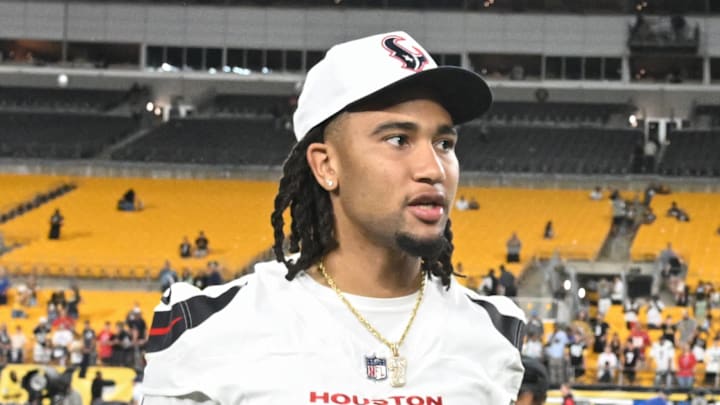 Houston Texans quarterback C.J. Stroud talks with Pittsburgh Steelers wide receiver George Pickens.