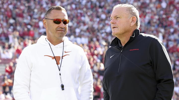 Texas Longhorns head coach Steve Sarkisian and Arkansas Razorbacks head coach Sam Pittman interact prior to the game at Donald W. Reynolds Razorback Stadium. Texas Longhorns head coach Steve Sarkisian and Arkansas Razorbacks head coach Sam Pittman interact prior to the game at Donald W. Reynolds Razorback Stadium.