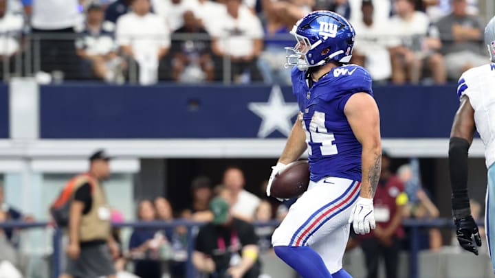 Sep 14, 2025; Arlington, Texas, USA; New York Giants running back Cam Skattebo (44) reacts after scoring a touchdown against the Dallas Cowboys during the fourth quarter at AT&T Stadium. Mandatory Credit: Kevin Jairaj-Imagn Images