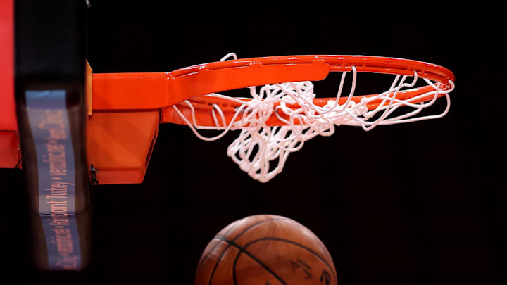Oct 27, 2025; Houston, Texas, USA; A detail shot of a basketball going through the hoop.