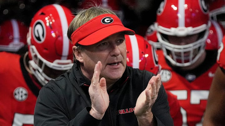 Georgia coach Kirby Smart takes the field with his team before the start of the SEC championship game against Texas in Atlanta, on Saturday, Dec. 7, 2024. Georgia coach Kirby Smart takes the field with his team before the start of the SEC championship game against Texas in Atlanta, on Saturday, Dec. 7, 2024.