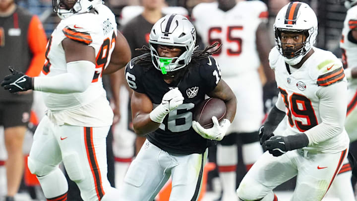 Sep 29, 2024; Paradise, Nevada, USA; Las Vegas Raiders wide receiver Jakobi Meyers (16) gains yardage against the Cleveland Browns during the fourth quarter at Allegiant Stadium. Mandatory Credit: Stephen R. Sylvanie-Imagn Images