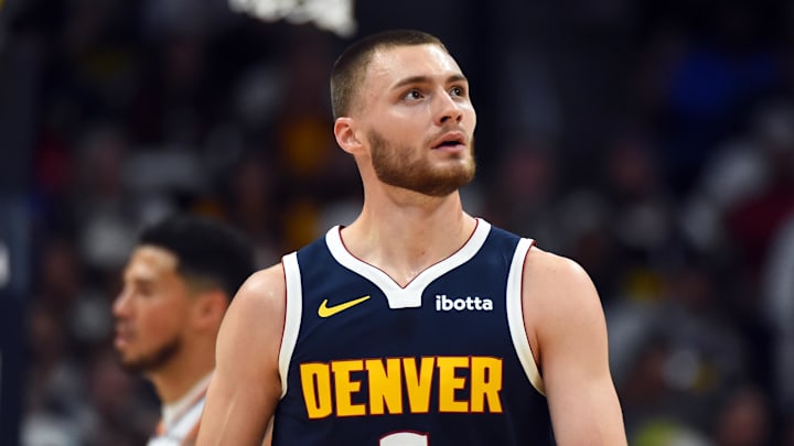 Oct 25, 2025; Denver, Colorado, USA; Denver Nuggets guard Christian Braun (0) walks back to the bench after a play during the first half against the Phoenix Suns at Ball Arena. Mandatory Credit: Christopher Hanewinckel-Imagn Images Oct 25, 2025; Denver, Colorado, USA; Denver Nuggets guard Christian Braun (0) walks back to the bench after a play during the first half against the Phoenix Suns at Ball Arena. Mandatory Credit: Christopher Hanewinckel-Imagn Images