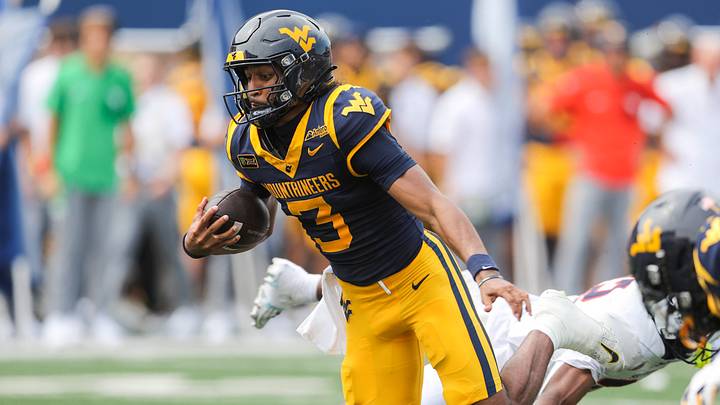 Sep 12, 2026; Morgantown, West Virginia, USA; West Virginia Mountaineers quarterback Michael Hawkins Jr. (3) runs the ball during the second quarter against the UT Martin Skyhawks at Milan Puskar Stadium. Mandatory Credit: Ben Queen-Imagn Images Sep 12, 2026; Morgantown, West Virginia, USA; West Virginia Mountaineers quarterback Michael Hawkins Jr. (3) runs the ball during the second quarter against the UT Martin Skyhawks at Milan Puskar Stadium. Mandatory Credit: Ben Queen-Imagn Images