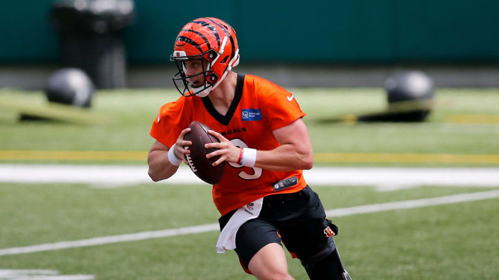 Bengals quarterback Joe Burrow scrambles during a minicamp practice at Paul Brown Stadium in Cincinnati on Tuesday.
Cincinnati Bengals Mini Camp Bengals quarterback Joe Burrow scrambles during a minicamp practice at Paul Brown Stadium in Cincinnati on Tuesday.
Cincinnati Bengals Mini Camp