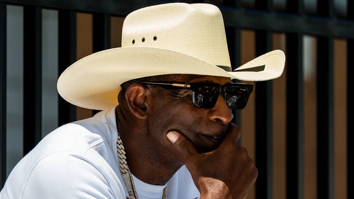 Deion Sanders takes in the second day of Cleveland Browns training camp, July 30, 2026, in Berea, Ohio. Deion Sanders takes in the second day of Cleveland Browns training camp, July 30, 2026, in Berea, Ohio.