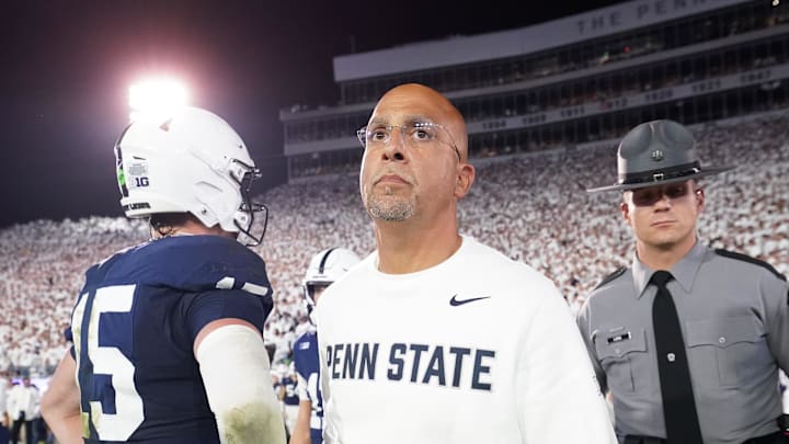 Sep 27, 2025; University Park, Pennsylvania, USA; Penn State Nittany Lions head coach James Franklin and quarterback Drew Allar (15) react after losing to the Oregon Ducks at Beaver Stadium.